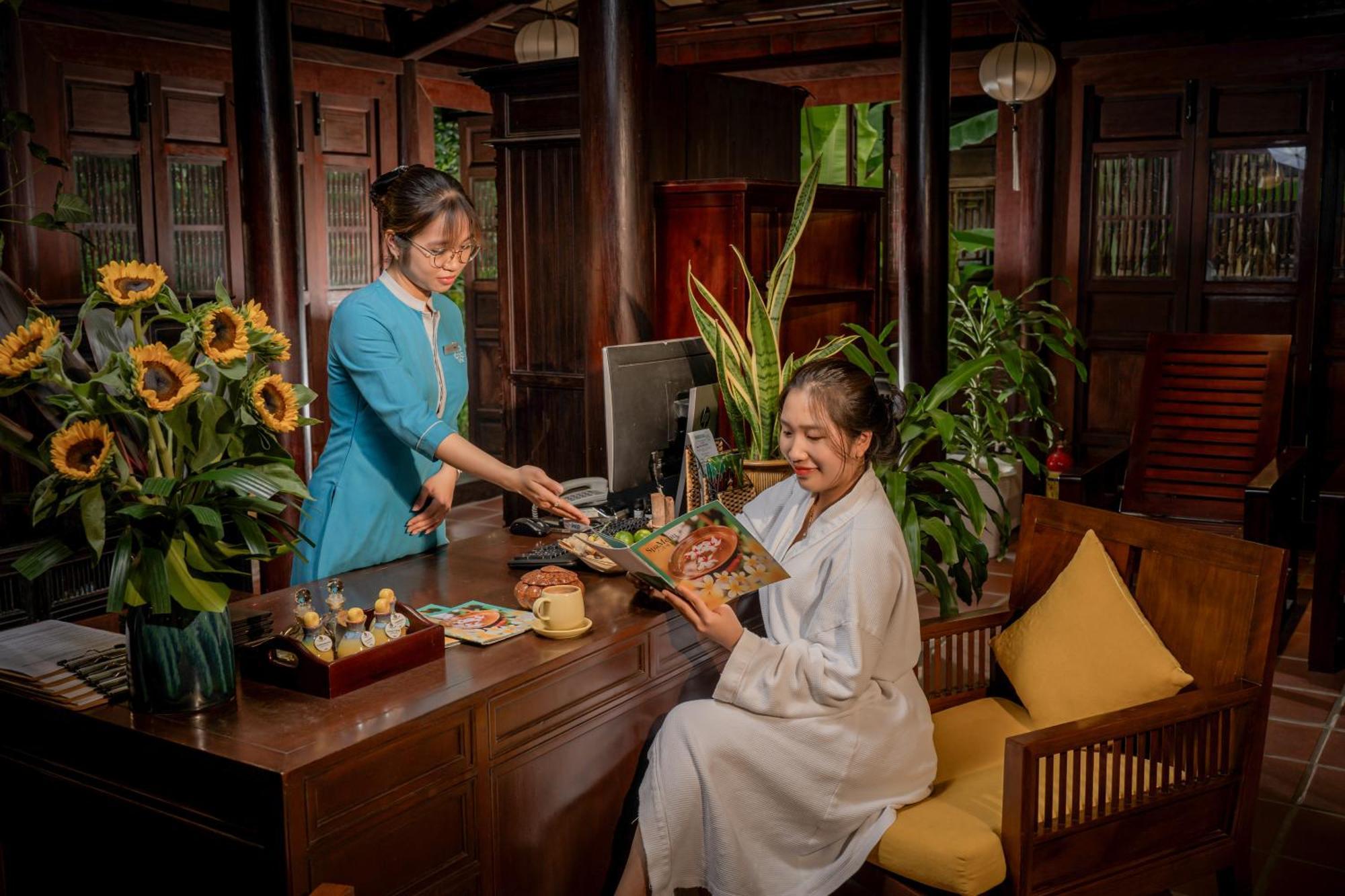 Rivertown Hoi An Resort & Spa Kültér fotó Reception at the hotel